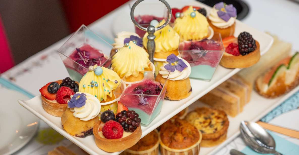 London: Gin and Afternoon Tea Bus Tour with Audio Guide - Getting on the Routemaster: Victoria or Trafalgar in about 90 minutes