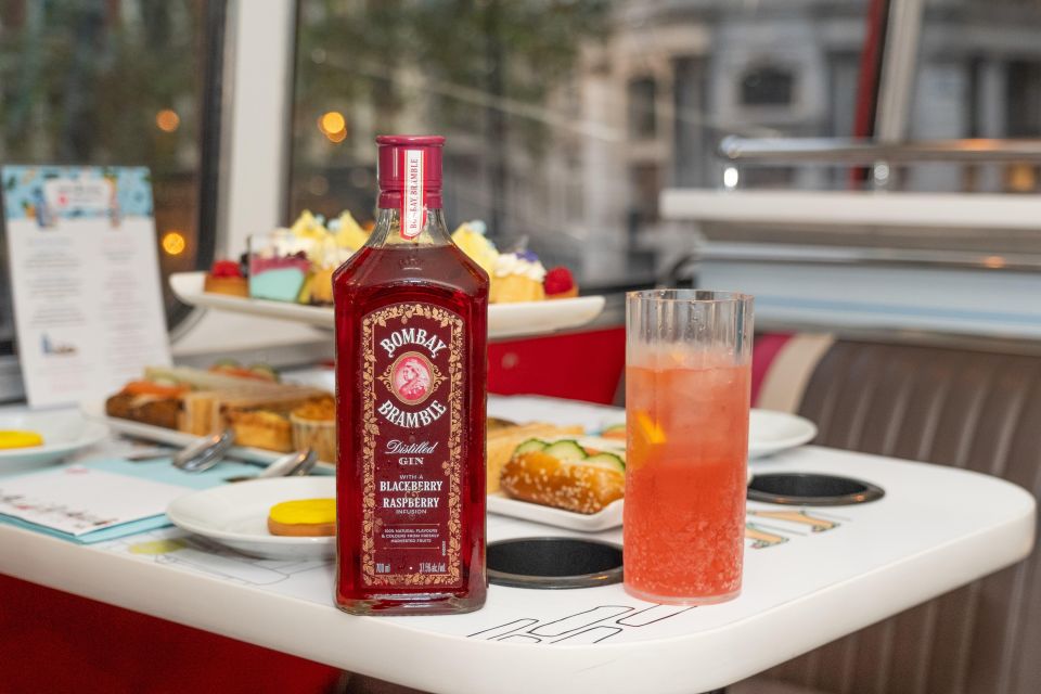 London: Gin and Afternoon Tea Bus Tour with Audio Guide - How the audio guide keeps the tour fun, not stressful