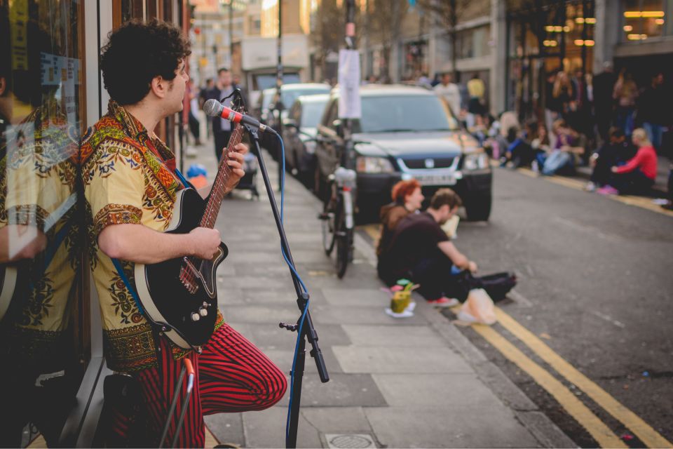 London: Markets, Street Art, and Camden Town Walking Tour - Camden Town Market: Beer Included, Street DJs, and Maximum Personality