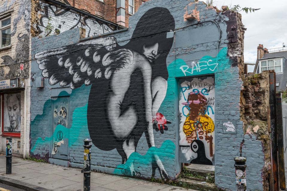 London: Markets, Street Art, and Camden Town Walking Tour - Jack the Ripper Trail: The Ten Bells and Spitalfields Atmosphere
