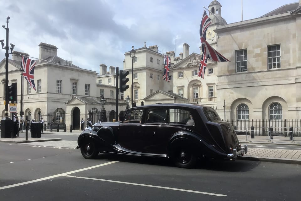 London: Winston Churchill Walking Tour with War Rooms Ticket - The Churchill statue and the pub nearby: why that monument matters
